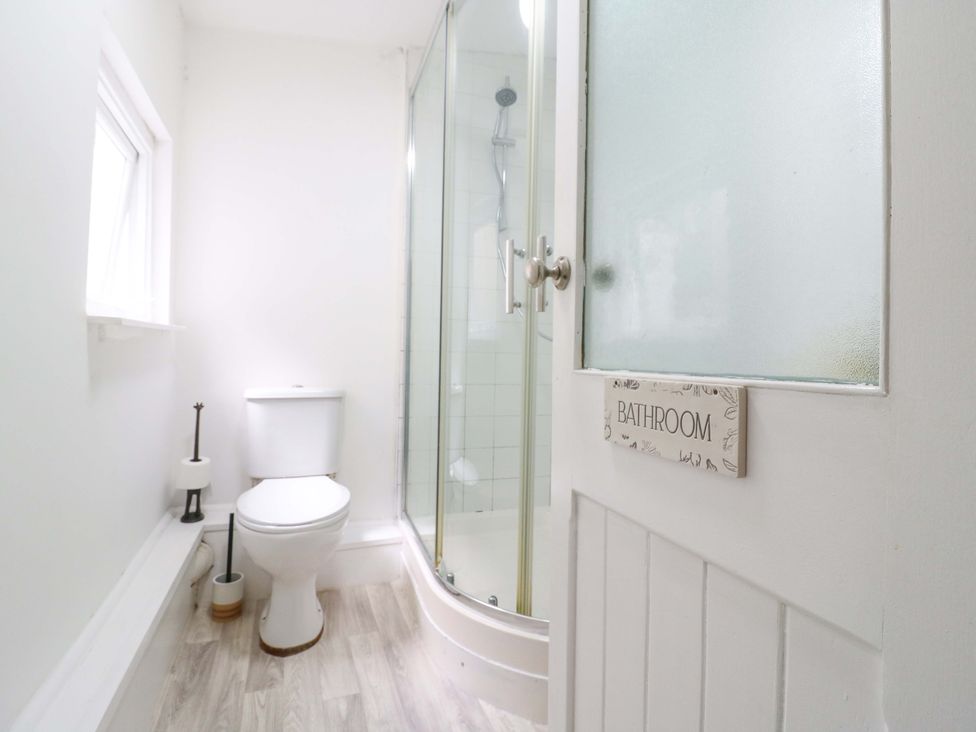 A bathroom with a shower and toilet at 7 Athol Terrace