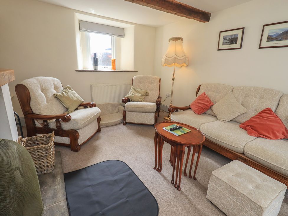 A living room with two armchairs and a sofa at 4 Oak Cottages in Bentham, Yorkshire