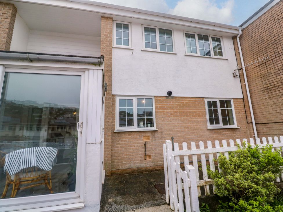 An exterior view of a house with windows and a fenced area at 16 Forth An Nance Redruth