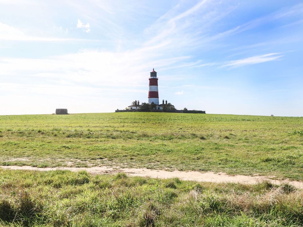 A lighthouse on a grassy field at The Ivy in Norwich