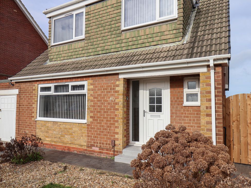 A house with a front door and windows at Sea View House in Marske-By-The-Sea