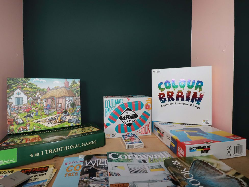 A collection of board games and magazines in a playroom at Trelowen in Trenance