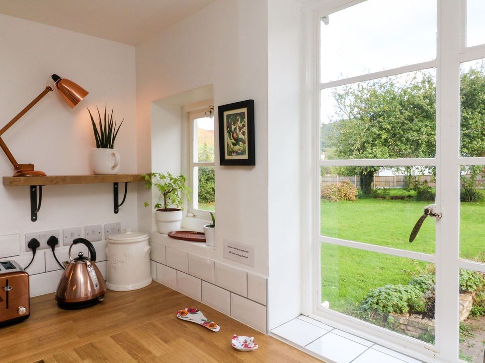 A kitchen with a kettle and toaster at Barton Lodge in Porlock