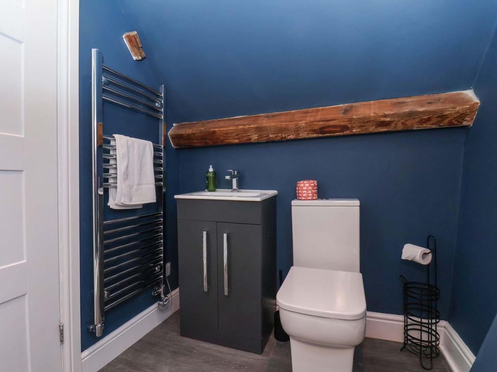 A bathroom with a sink and toilet at The Four Views in Whitby