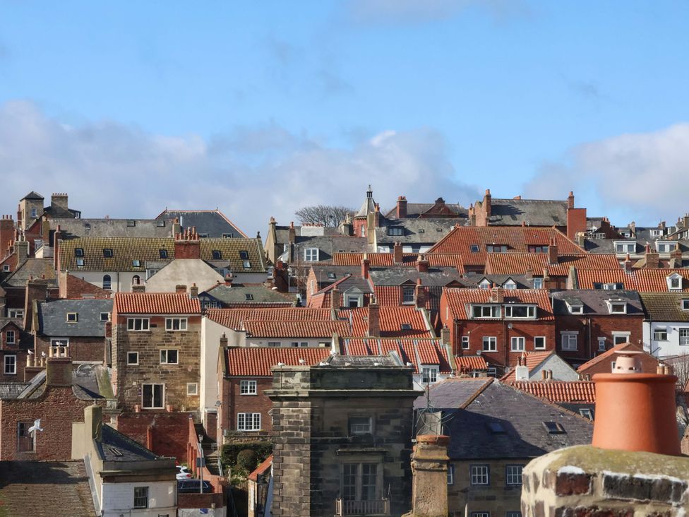 A view of rooftops and buildings at The Four Views in Whitby