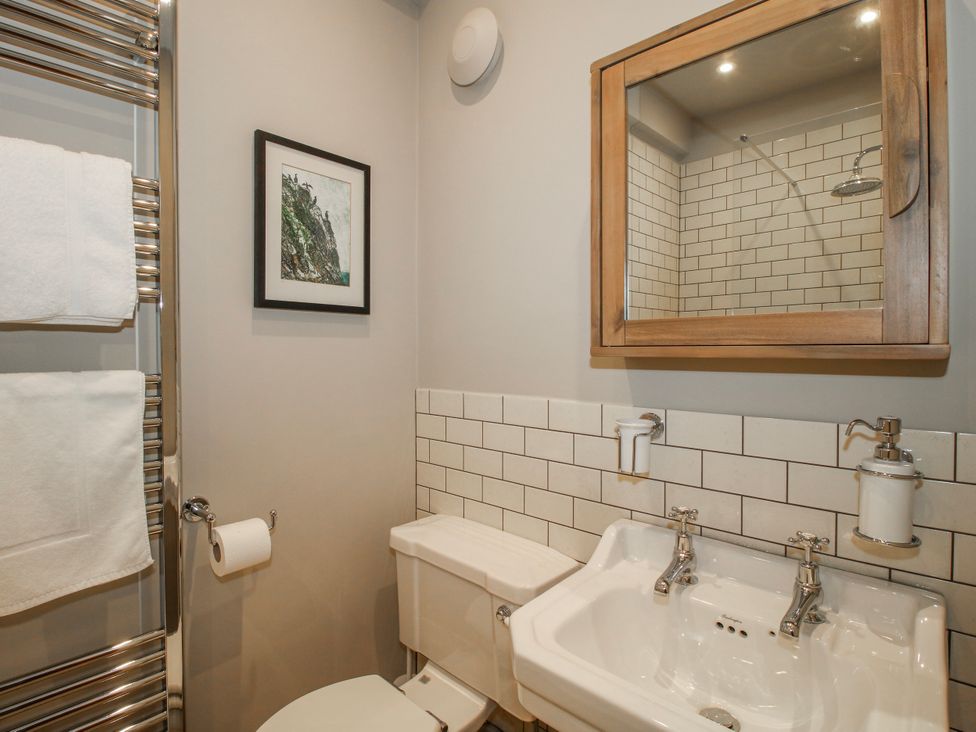 A bathroom with a sink and toilet at The Old China Shop in Ludlow