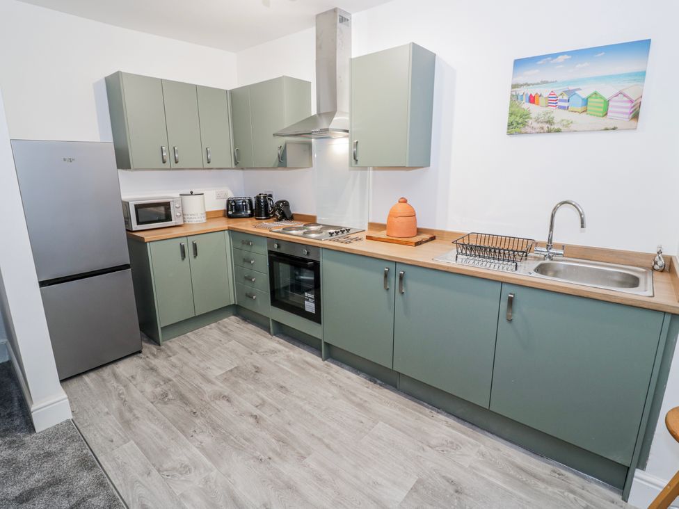 A kitchen with appliances and cabinets at Little Marrakesh Lodge in Worcester