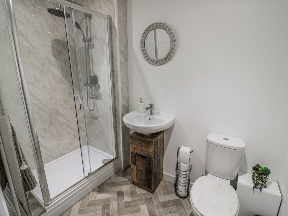A bathroom with a shower, sink, and toilet at Little Marrakesh Lodge in Worcester