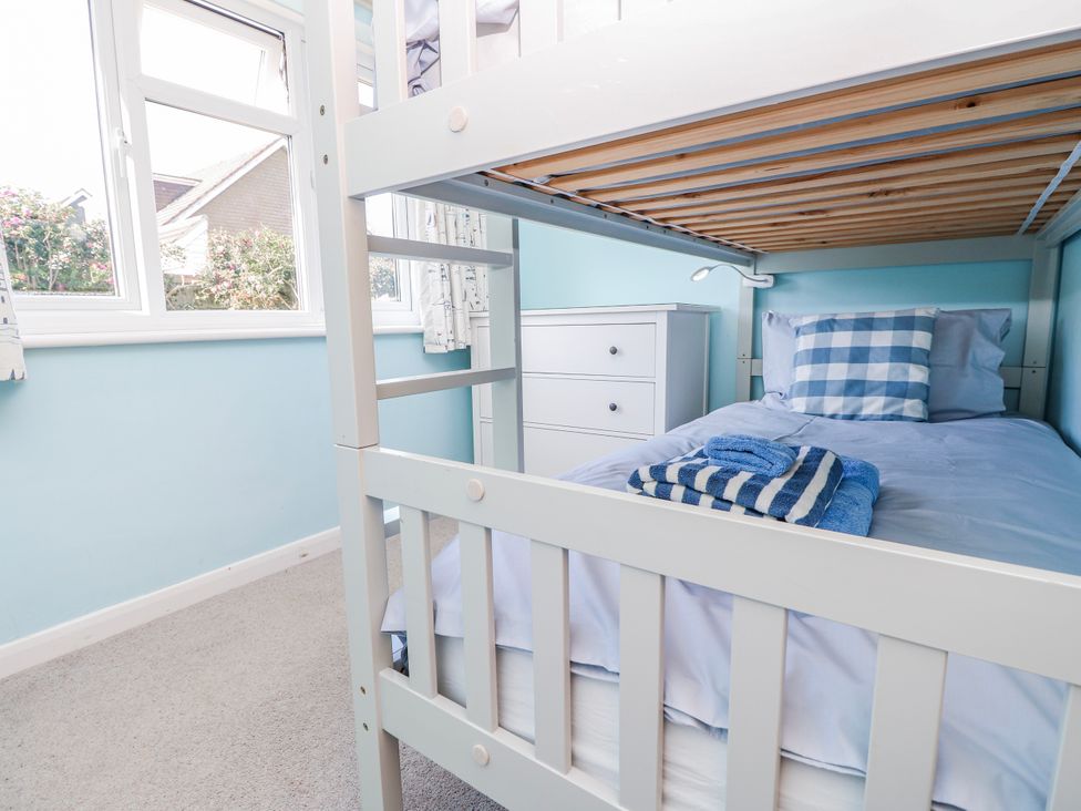 A bunk bed with a chest of drawers at 2 Trelawny Way in Bembridge
