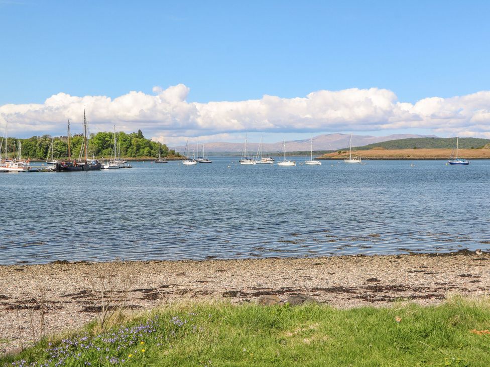 A view of boats on water near an island at Heather Island View