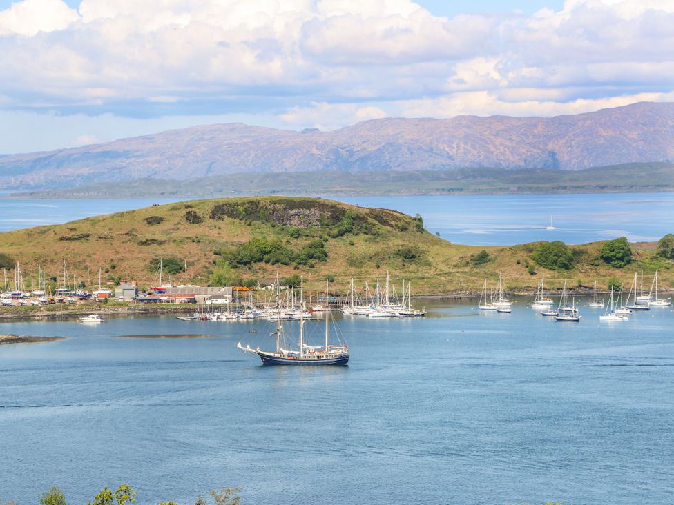 A view of boats in the water near an island at Heather Island View