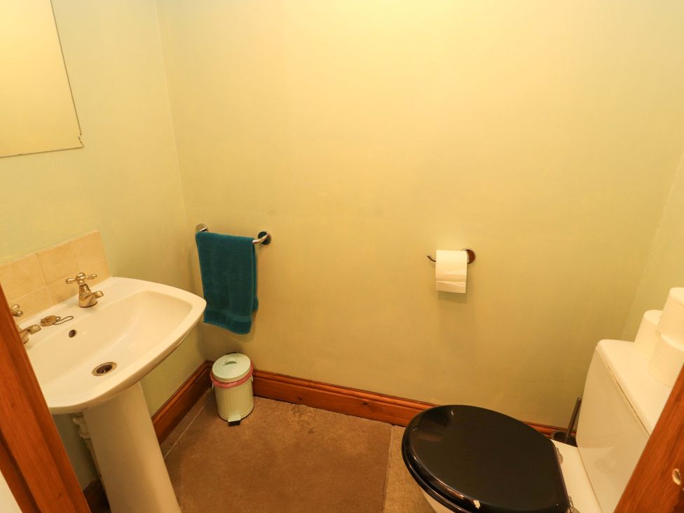 A bathroom with sink and toilet at High Mill House in Penrith