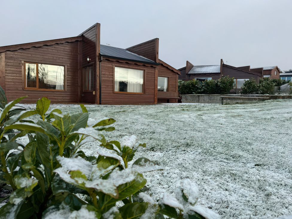 A house with grass and snow at No 6 Enniskillen