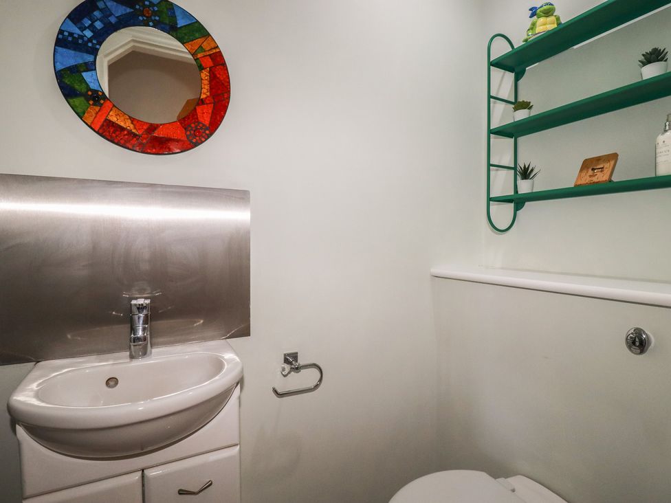 A bathroom with a sink and toilet at Carnweather in Newquay