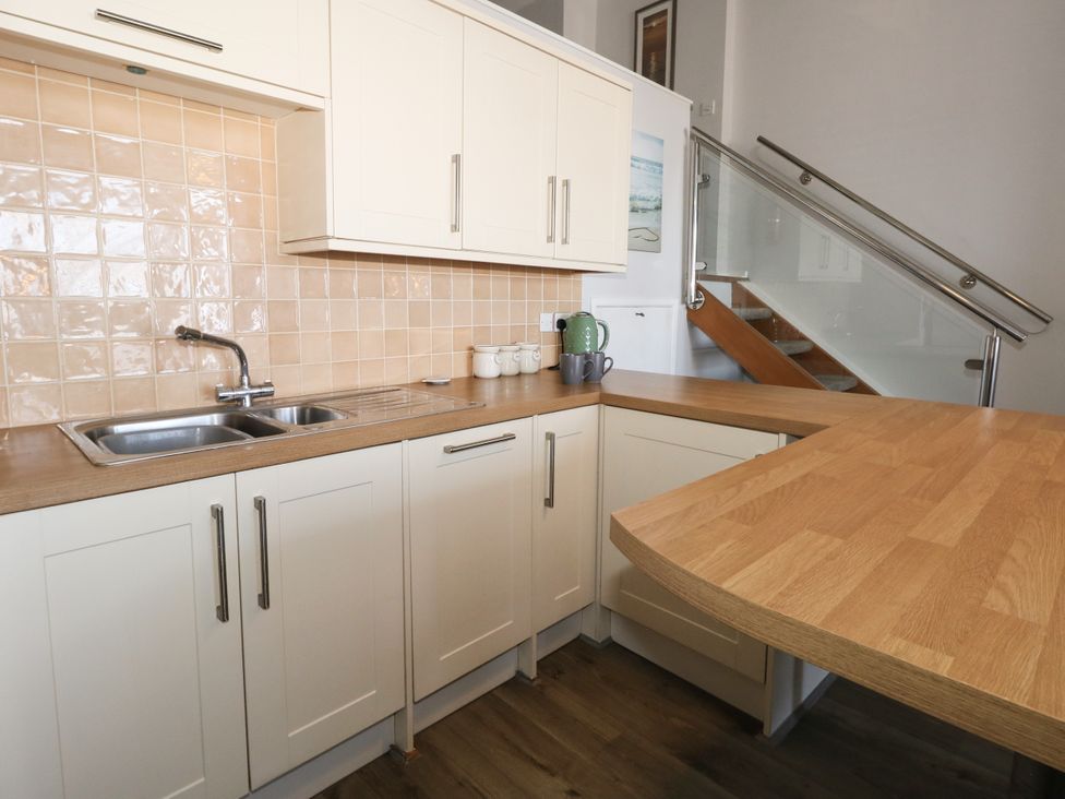 A kitchen with a sink and countertop at Chandlers Nook in Portland
