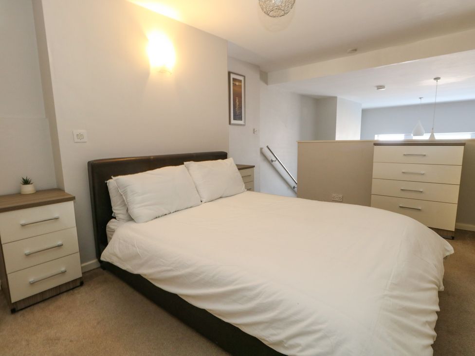 A bedroom with a bed and furniture at Chandlers Nook in Portland