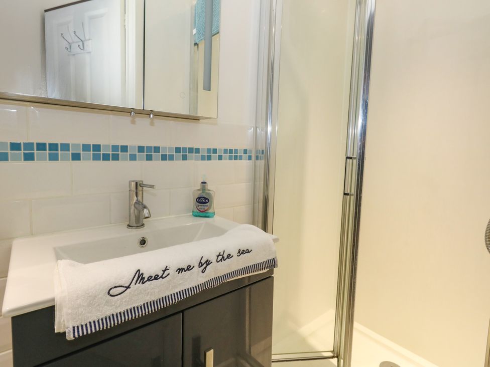 A bathroom with a sink and shower at Chandlers Nook in Portland