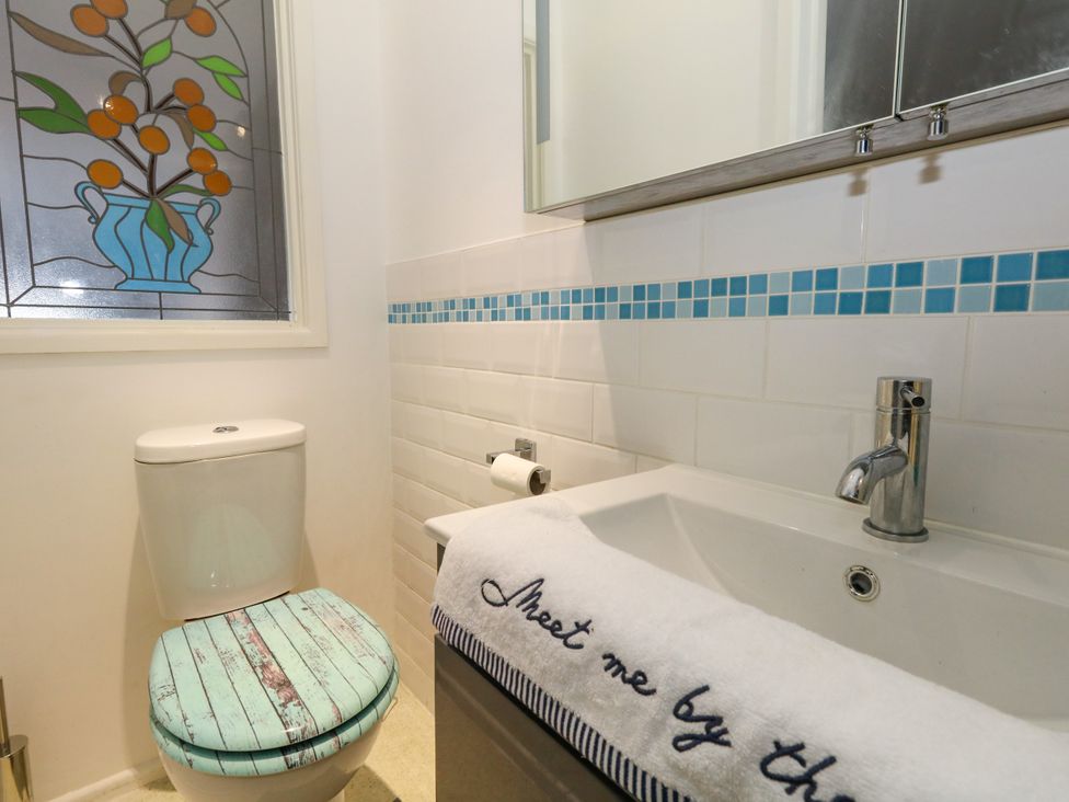 A bathroom with a sink and toilet at Chandlers Nook in Portland