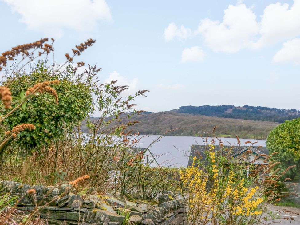 An outdoor view of a lake and hills at Wilders Wood Windermere