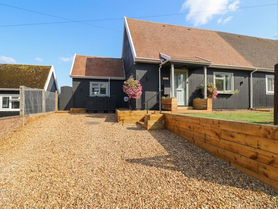 A house with gravel driveway and steps at 3 Swedish House Walgrave