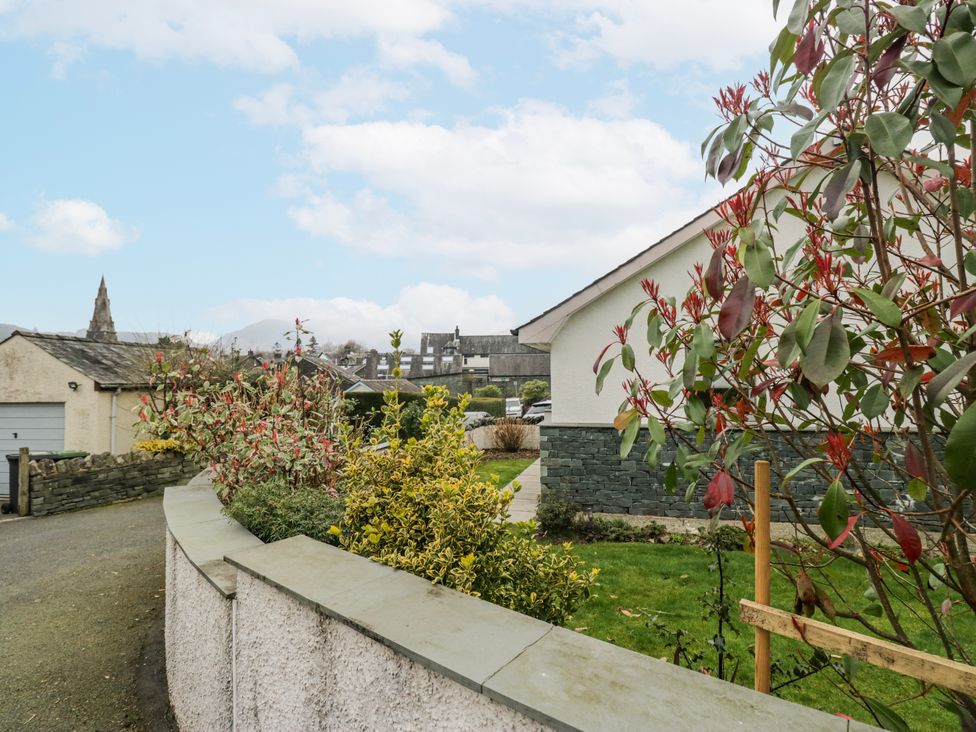 An outdoor view of plants and buildings at Ambwray in Ambleside