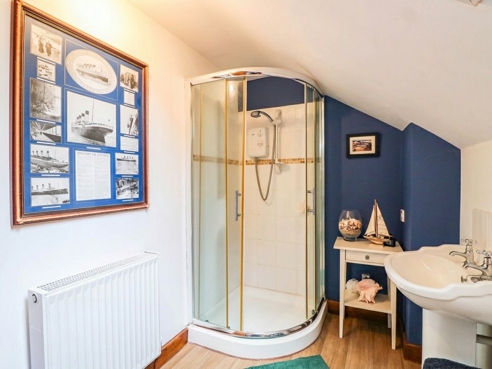 A bathroom with a shower and sink at The Barn in Tamworth