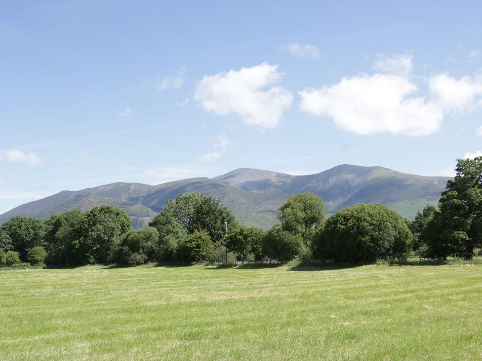 A view of mountains and trees in a field at Cottage 3 in Keswick