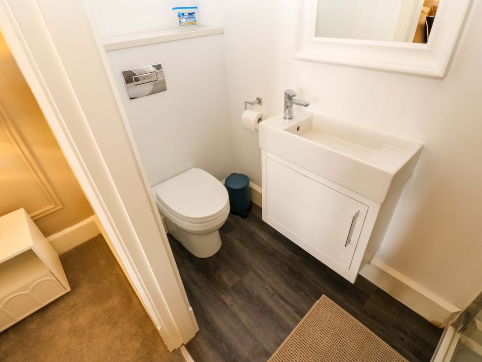 A bathroom with a sink and toilet at Flaxstead Grange in Newbottle