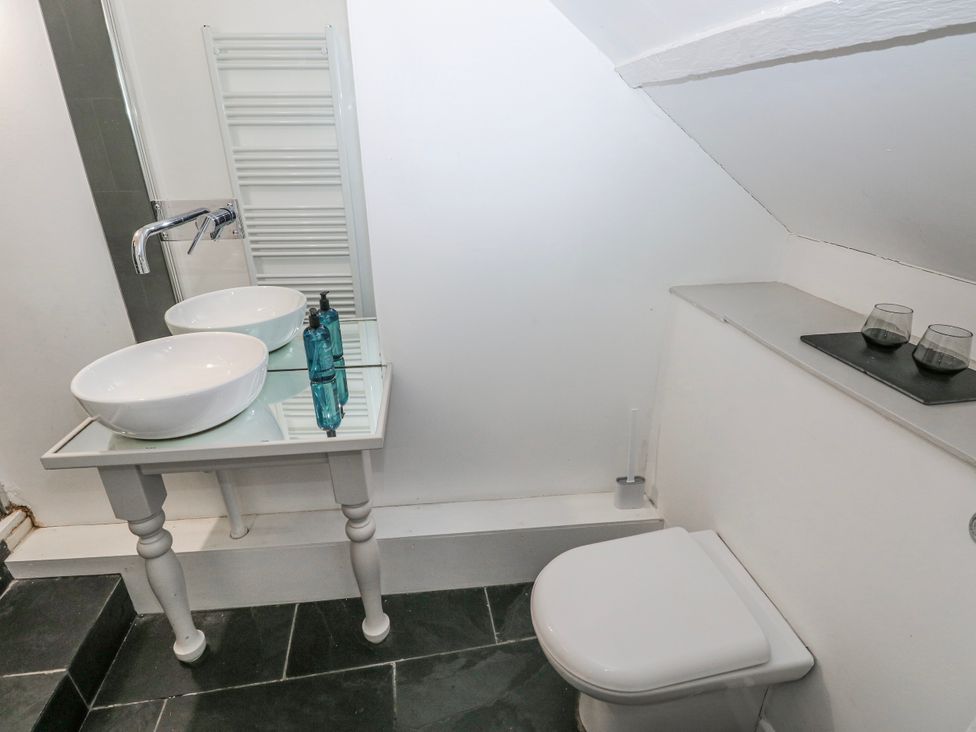A bathroom with sink and toilet at The Old Vicarage in Carmarthen
