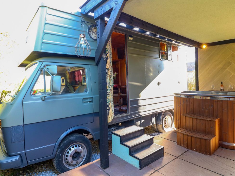 A vehicle beside a bar and steps at Old Rosie Grantham