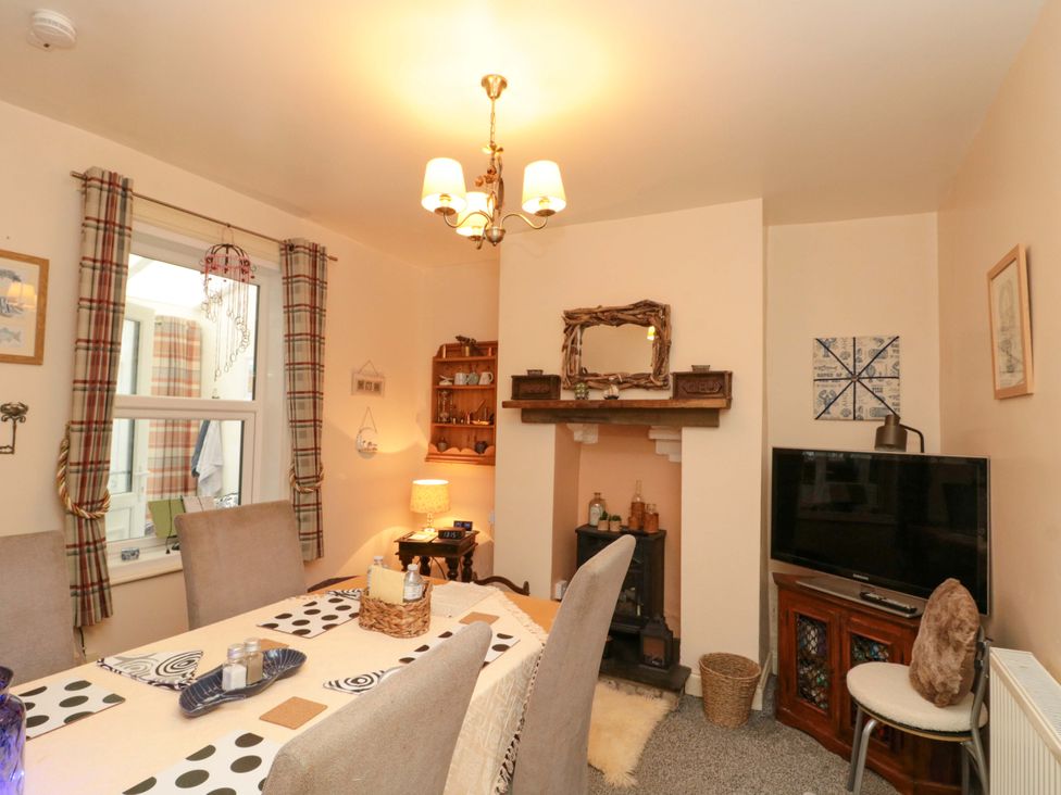A dining room with table and chairs at 46 Nelson Street in Bridlington