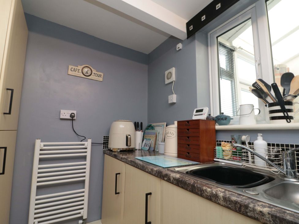 A kitchen with a sink and storage box at 46 Nelson Street in Bridlington