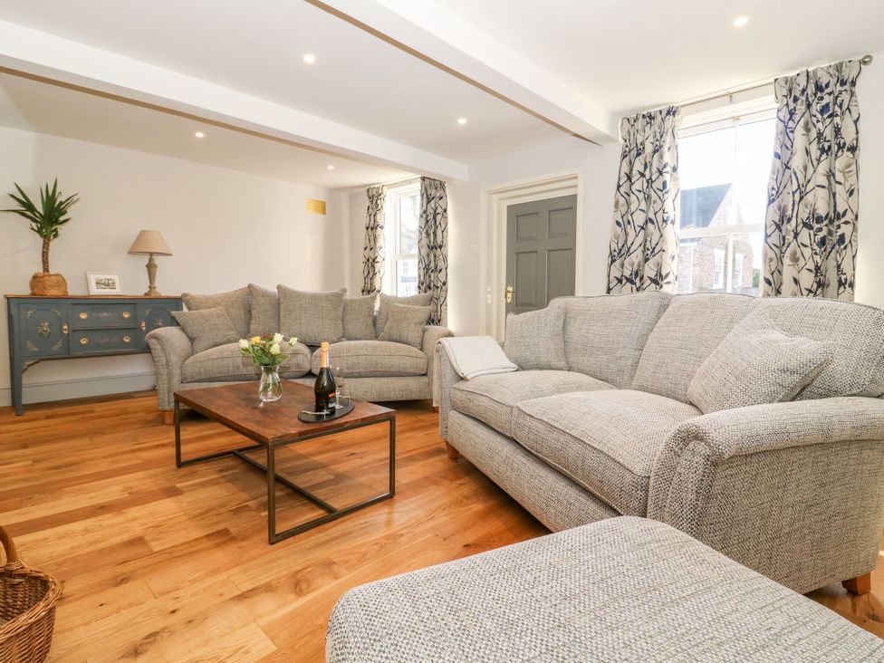A living room with sofas and a coffee table at the Old Post Office in York