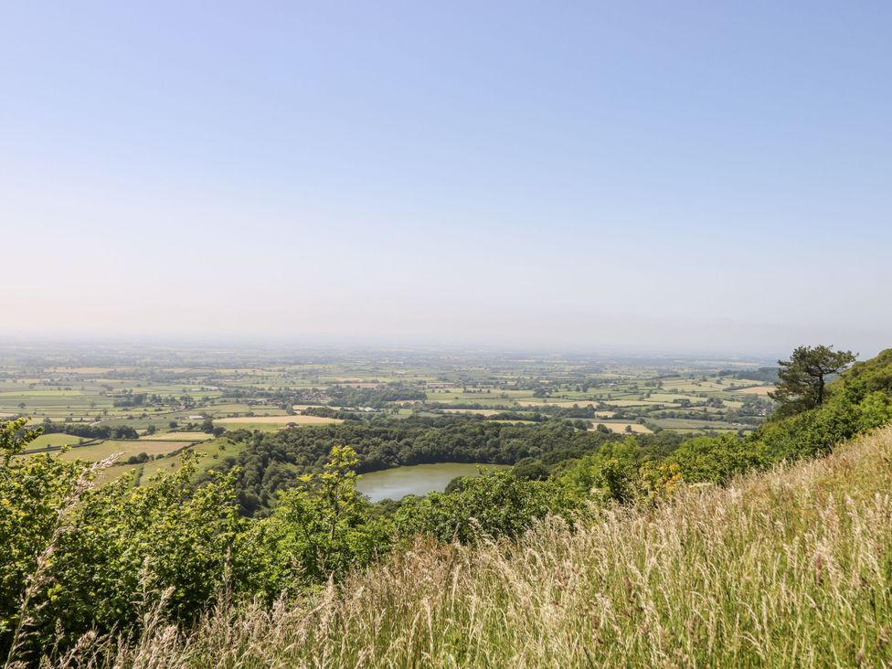 A landscape view with fields and a lake at The Old Post Office in York
