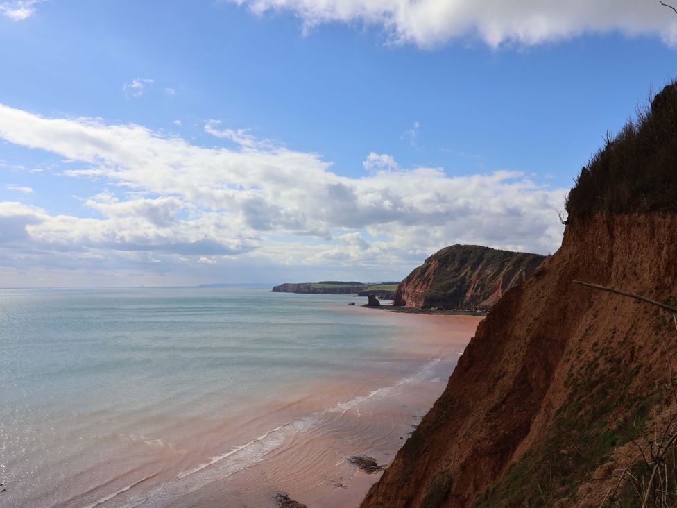 A coastal view with a cliff and sea at 4 Peaslands Road Sidmouth
