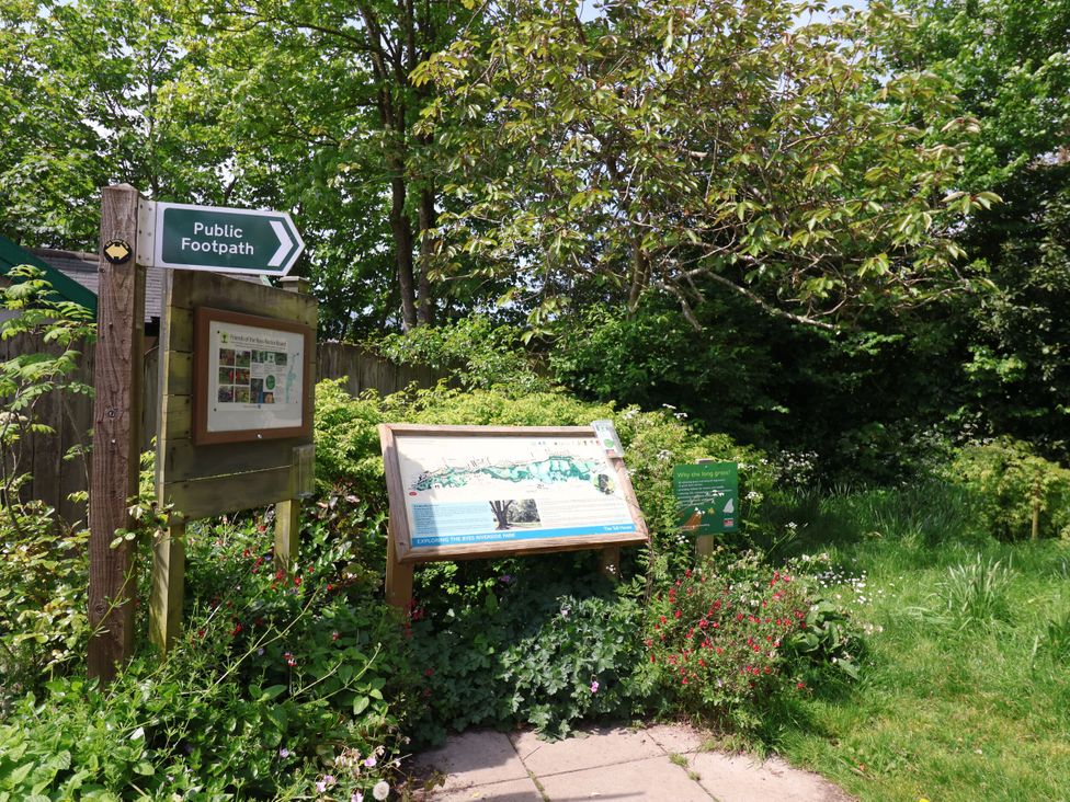 A public footpath sign and information board at 4 Peaslands Road Sidmouth