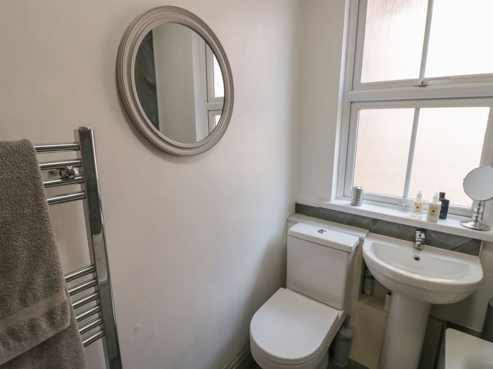 A bathroom with a sink and toilet at 141 Barnards Green Road in Barnard's Green, Malvern