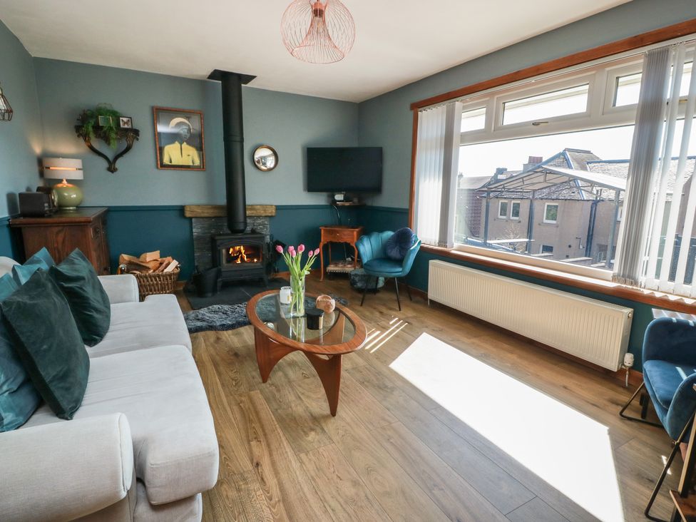 A living room with a sofa and coffee table at Crown Cottage near Newmills near Cairneyhill