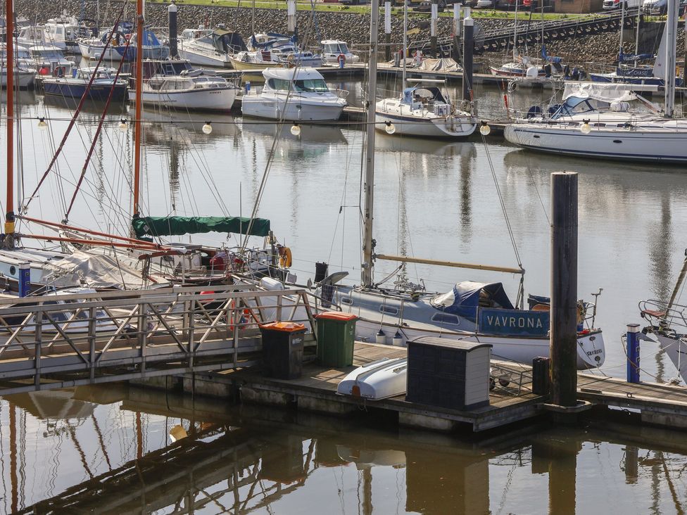 A marina with boats docked at Marina House in Whitby