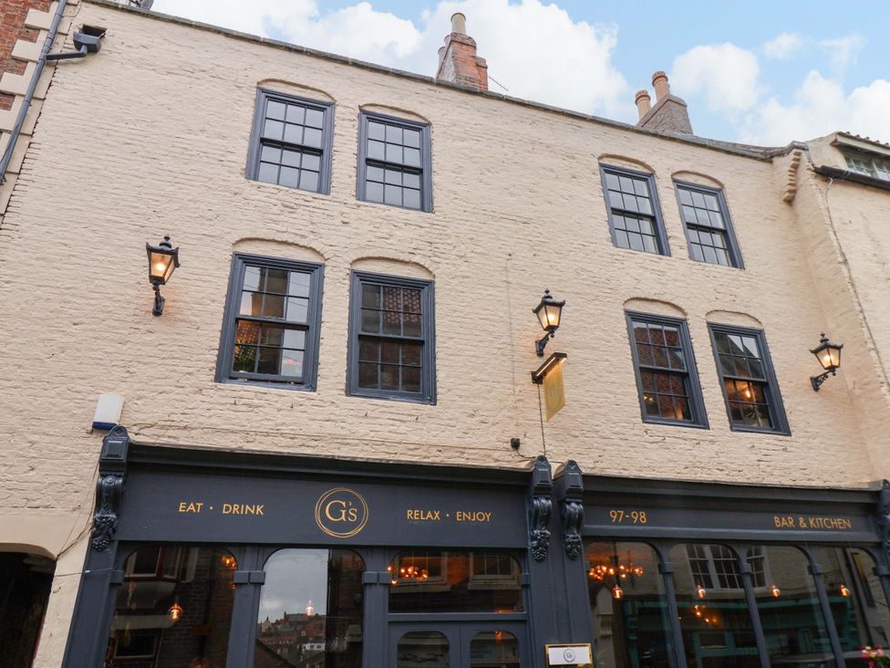 An exterior view of G's Loft with windows and lamps at G's Loft in Whitby
