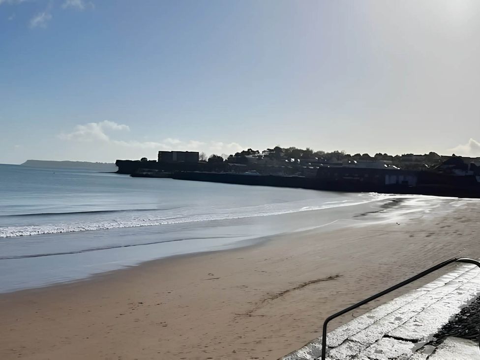 A beach with sand and water at Static Caravan Mallard Rise 22 Hoburne Devon Bay in Paignton