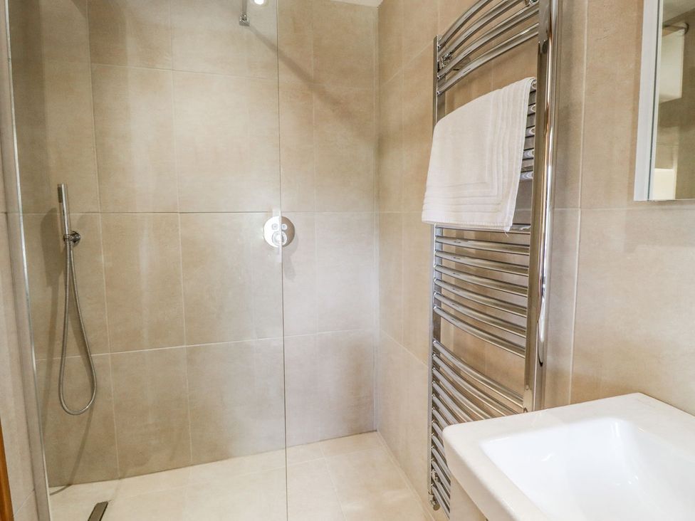 A shower with a towel rack in Orcaber Farmhouse Lancaster