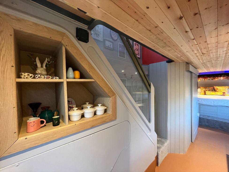 An interior space with shelves and decorative items at No 1 The Depot in Gateshead