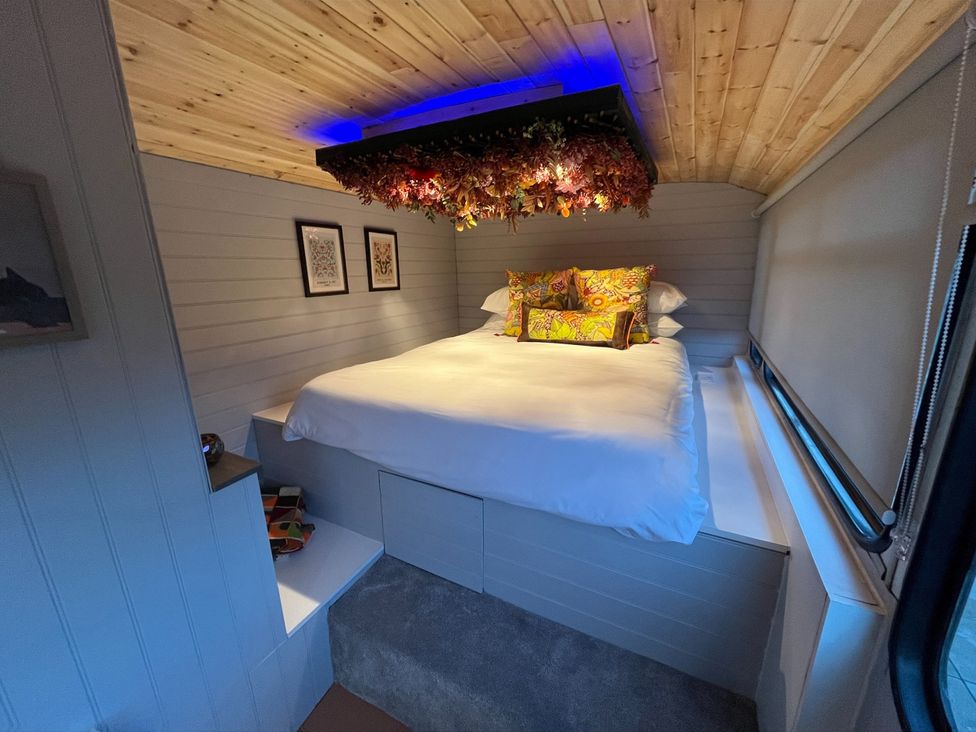 A bedroom with a bed and decorative elements at No 1 The Depot in Gateshead