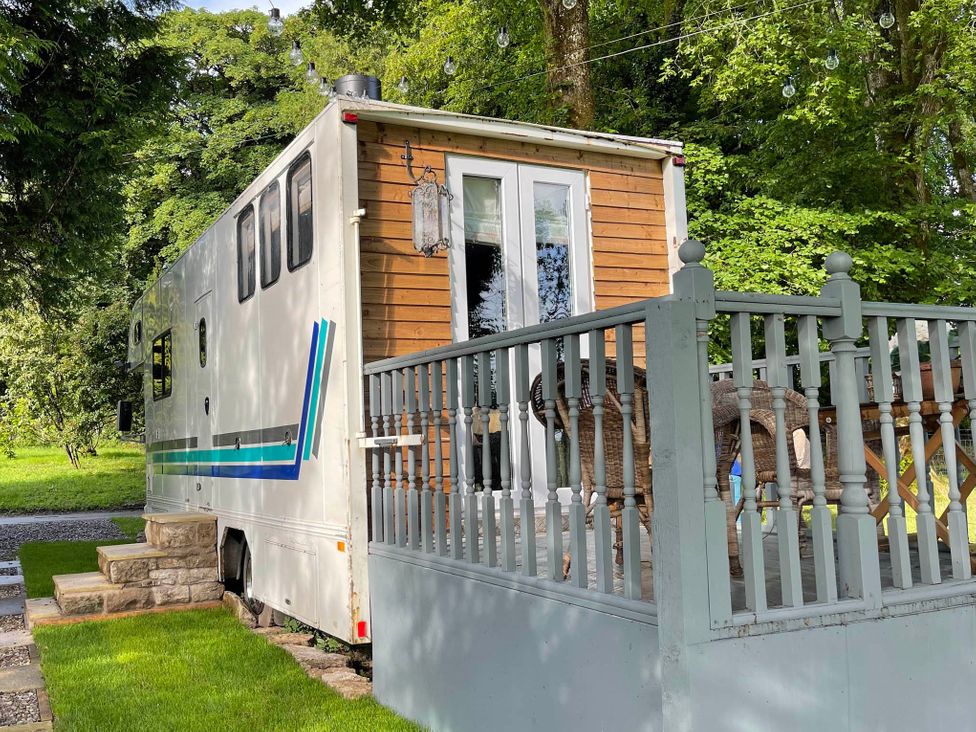 A horse box with a deck and steps at Dobbin the horse box in The Lake District Cockermouth