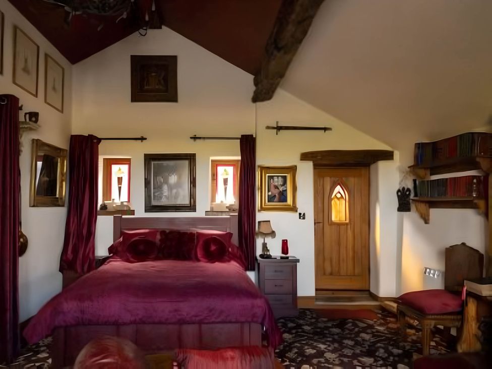 A bedroom with a bed and nightstand at 1 Bed Cottage - Sleeps 3 - Garden - Parking - Wifi in Buxton