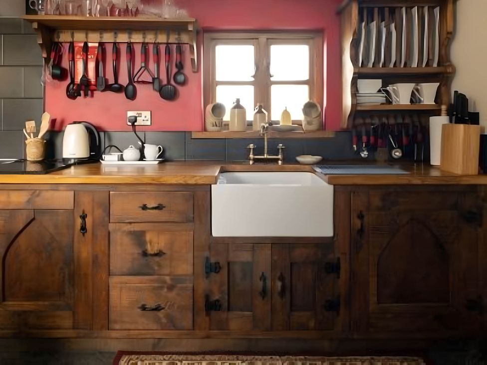 A kitchen with a wooden countertop and sink at 1 Bed Cottage - Sleeps 3 - Garden - Parking - Wifi, Buxton