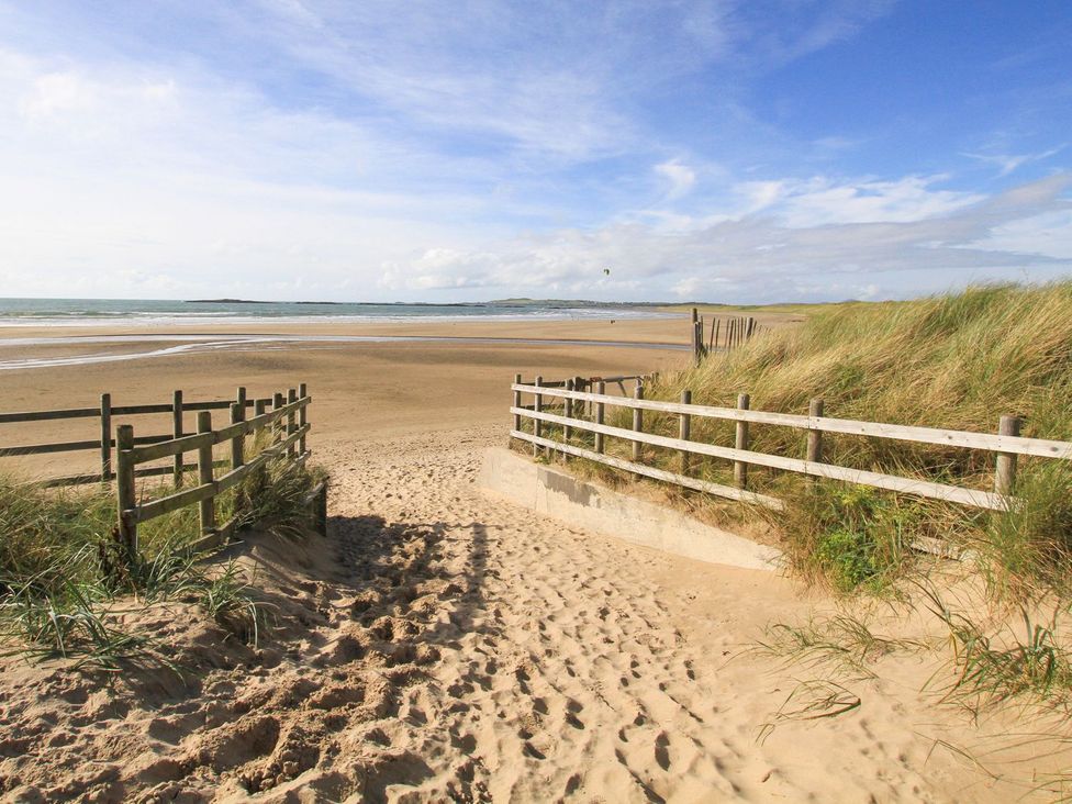 A pathway leading to the beach at Rhiwlas, Rhosneigr