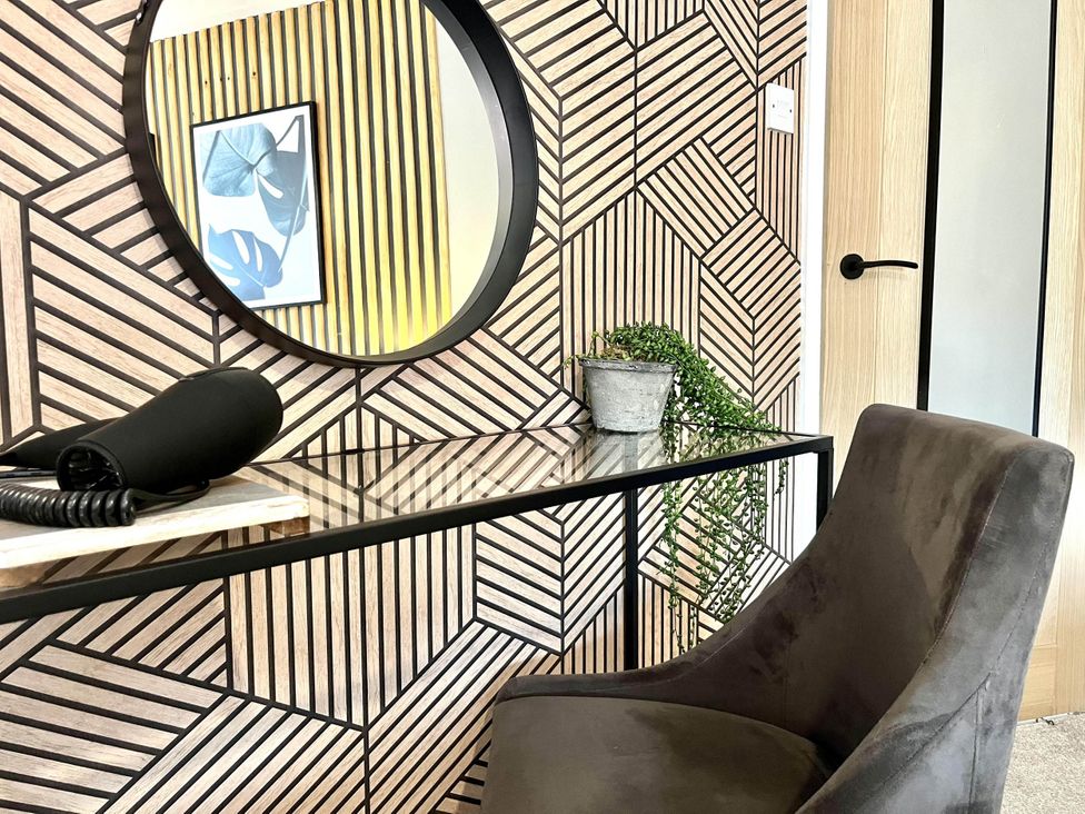 A dressing room with a mirror and a desk at Central Ellesmere - Stay 2 - Parking - PetFriendly