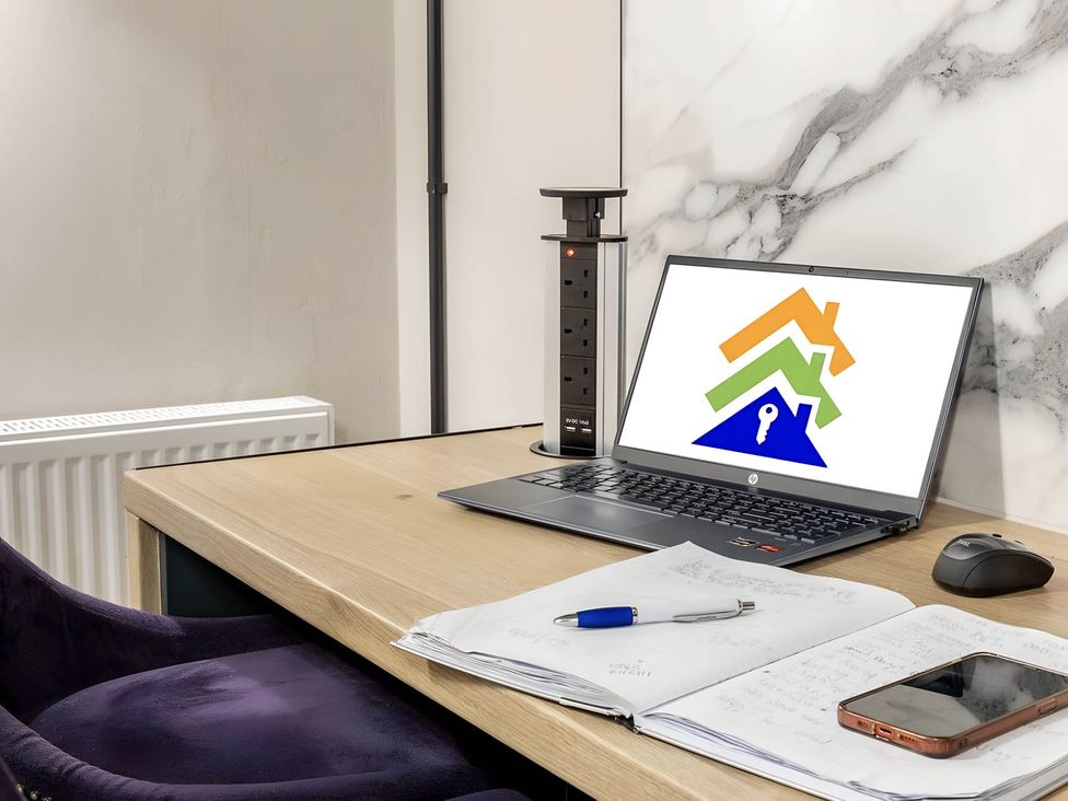 An office with a desk and laptop at CentralEllesmere - Sleeps4 - Parking - PetFriendly